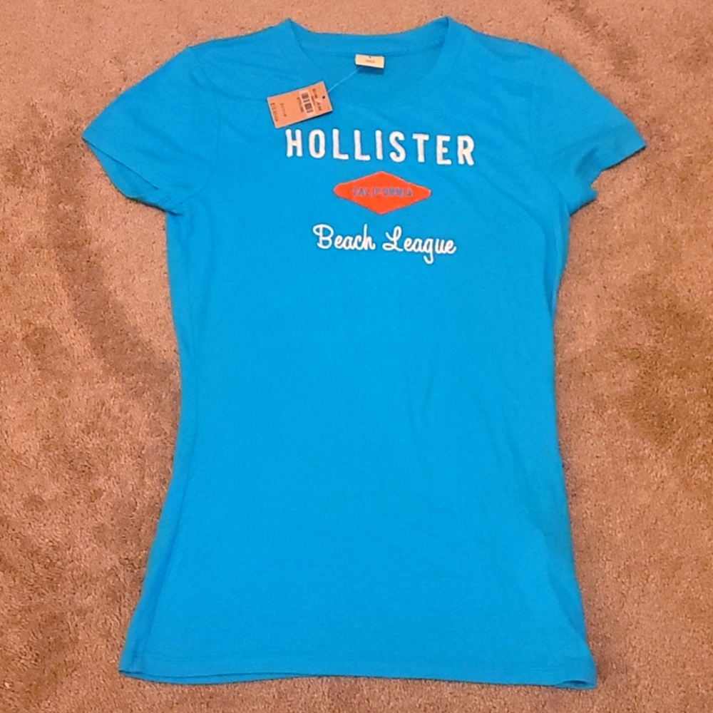 Hollister brand junior T-shirt.. Bright blue. Size large.   new with tags